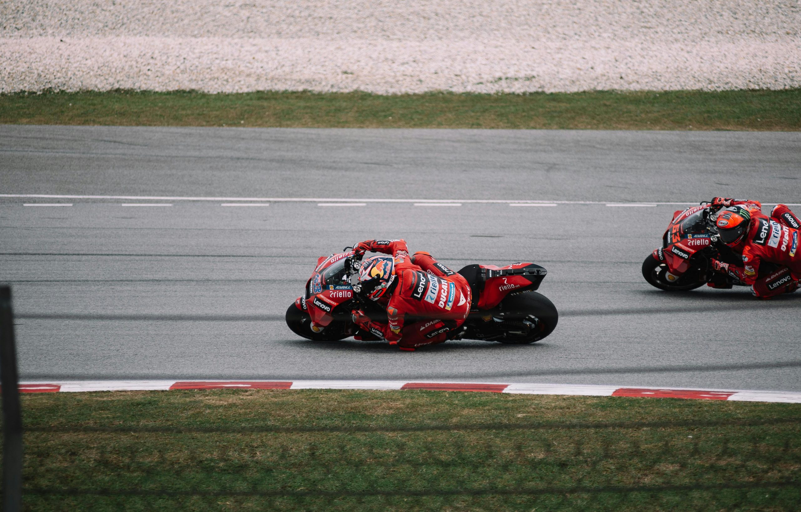 Thrilling motorcycle race showcasing speed and skill at Sepang International Circuit, Malaysia.